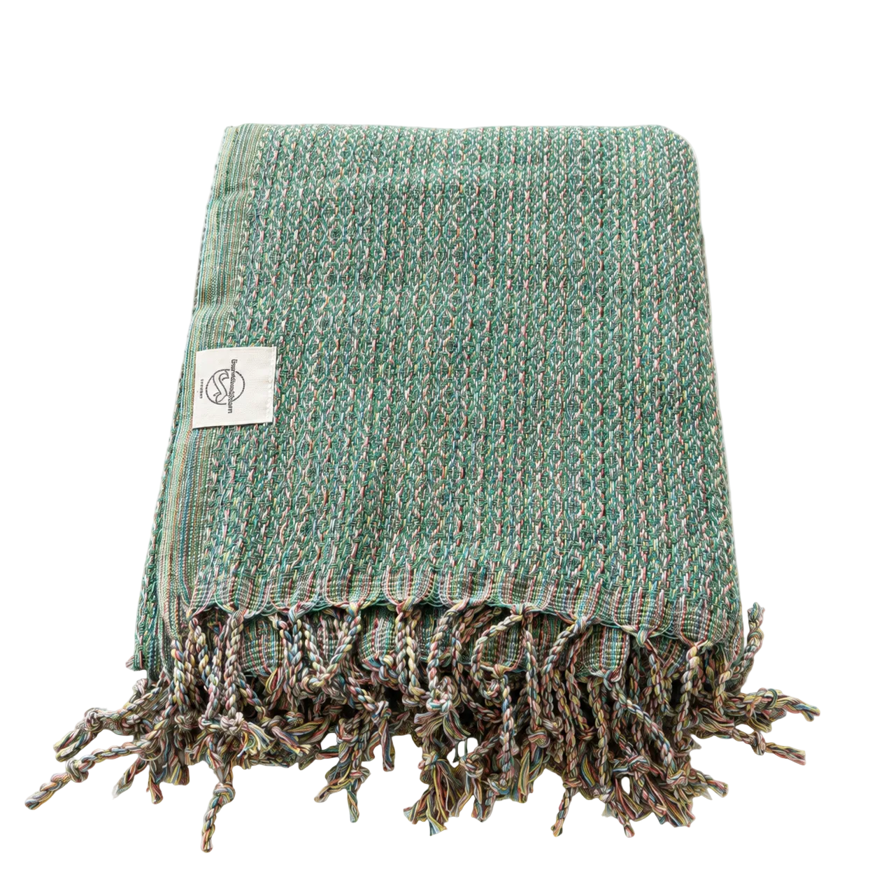Hammam-Handtuch Ocean von BeachAndSteam aus 100 % Baumwolle, weich und saugfähig, in blauer Meeresfarbe, liegend auf Holz.