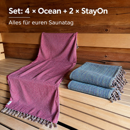 Hamamtuch-Set Paar: 4 × Hamamtuch Ocean und 2 × StayOn, ein StayOn über die Saunabank gezogen
