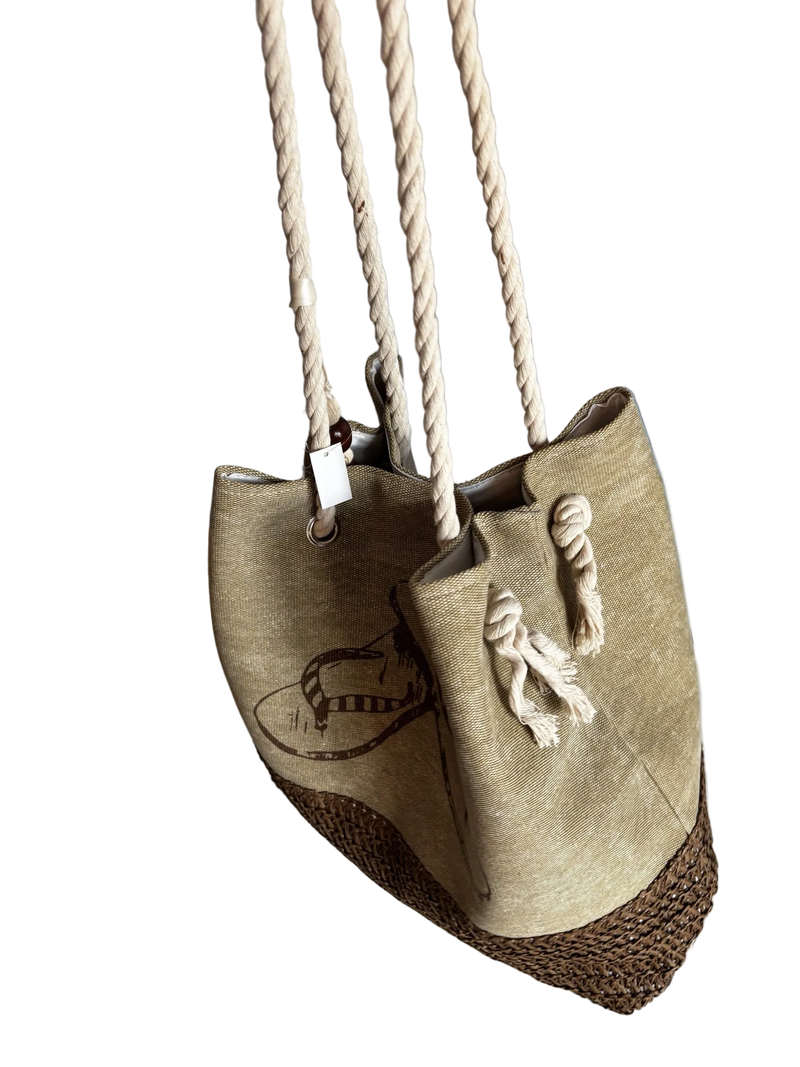 Strandtasche Flip-Flop, Seitenansicht mit Kordelhenkeln, Metallösen und Knoten mit Quaste